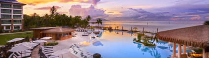 Hilton Tahiti Resort Pool and Pool bar at sunset